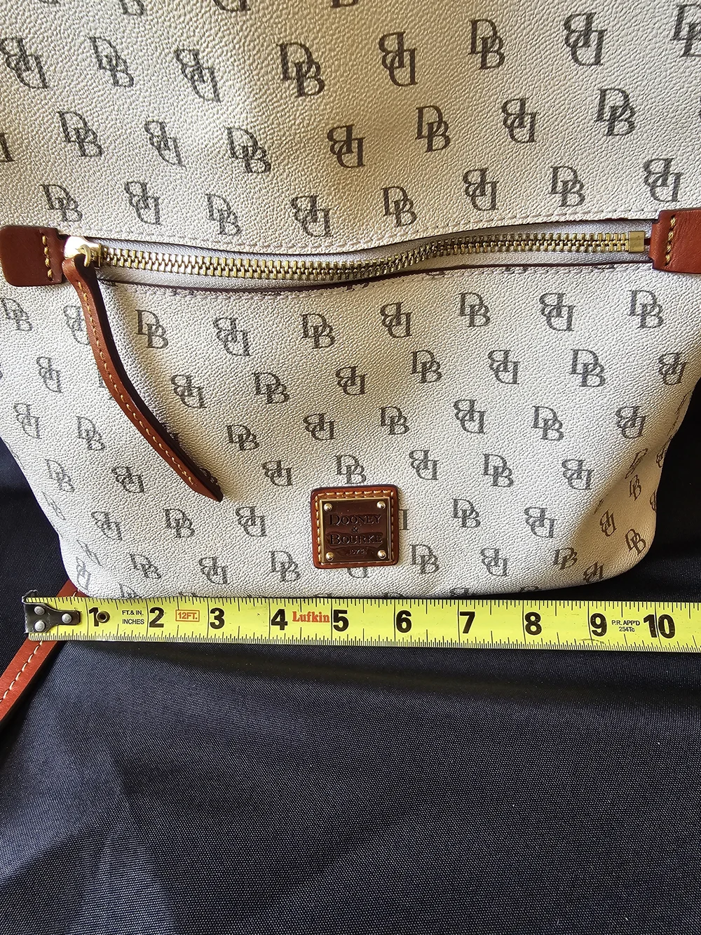 Dooney & Bourke Cream Signature Messenger Bag with Tan Trim